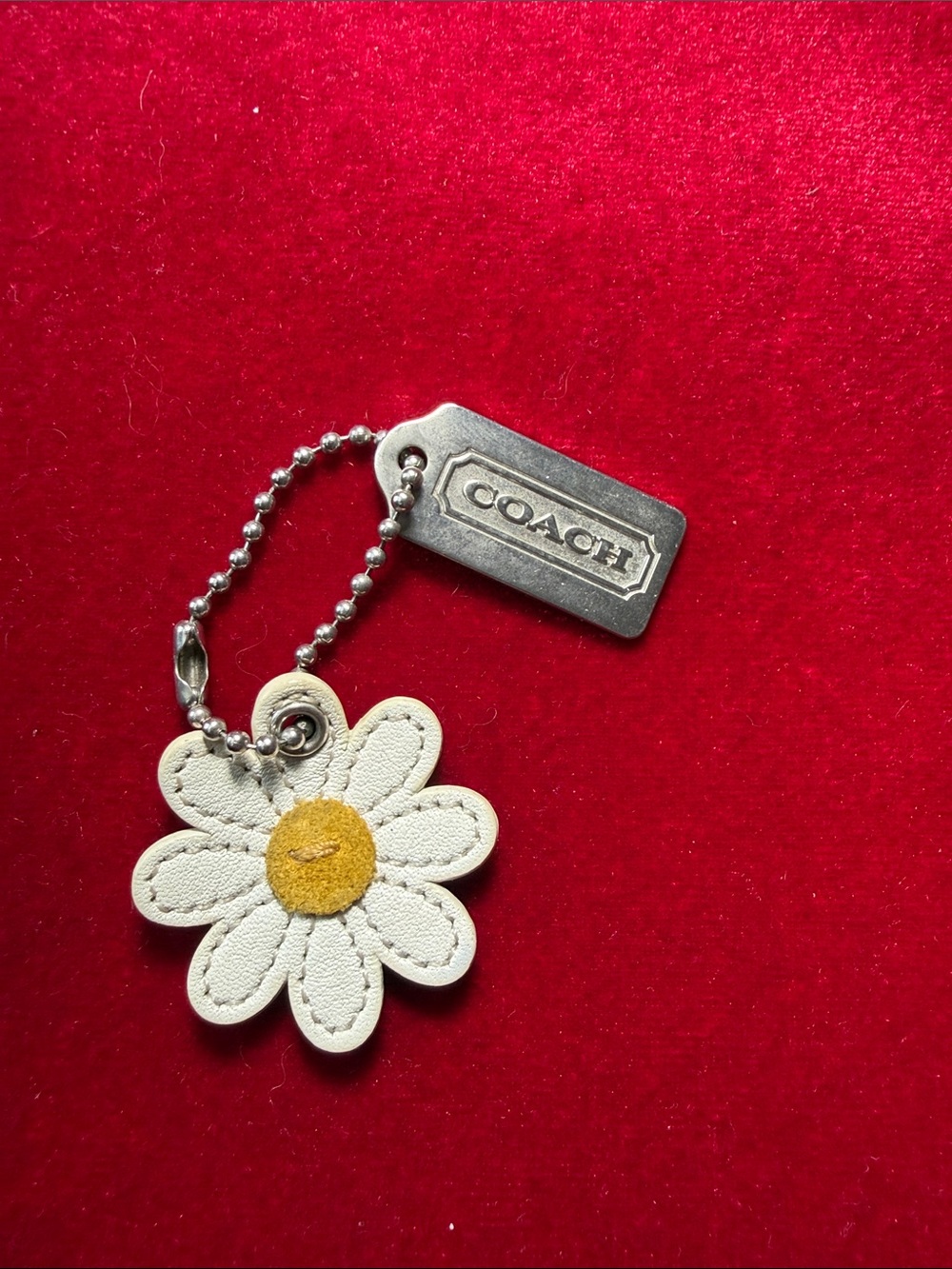 Coach White Daisy Leather Keychain with Yellow Center